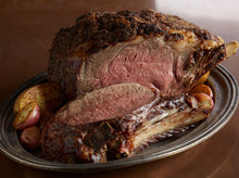 Load image into Gallery viewer, Black Angus Rib Roast. Take a second to think about this. Its basicaly all the bone in ribeye steaks before they are cut. Make a roast fit for celebrity or let the celerey butcher in you shine, by cutting your own ribeye&#39;s exactly how you want it.
