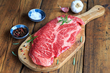 Load image into Gallery viewer, Chuck Steak/Roast. Bone in. All-natural, grain finished - Black Angus beef.
